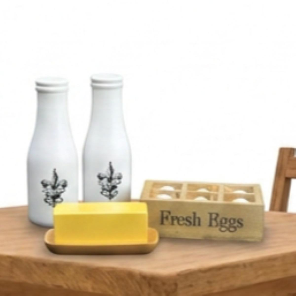 A Little House on the Prairie  miniature toy food set featuring white milk bottles, a block of butter, and a crate of fresh eggs.