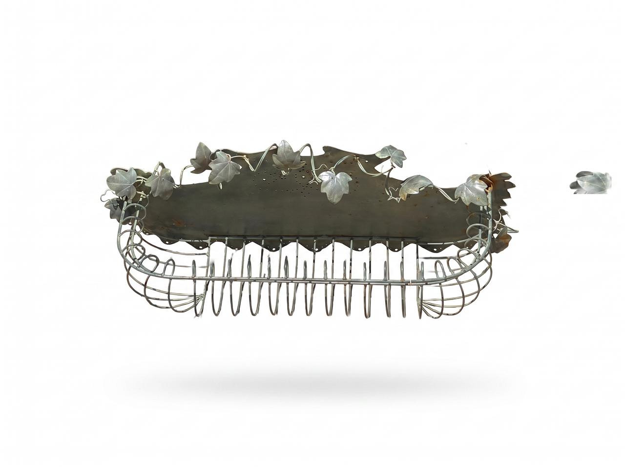 Vintage 34inch iron planter against a white backdrop.