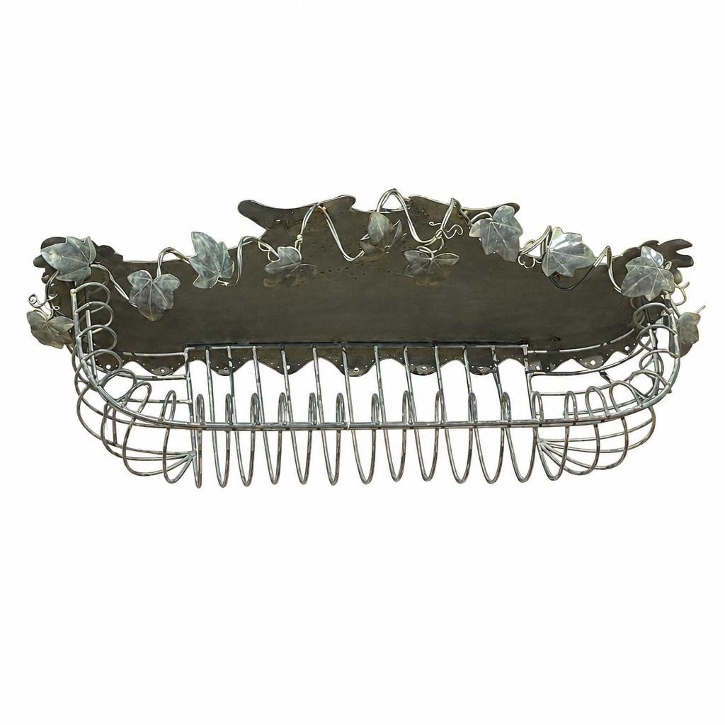 Vintage 34inch iron planter against a white backdrop.