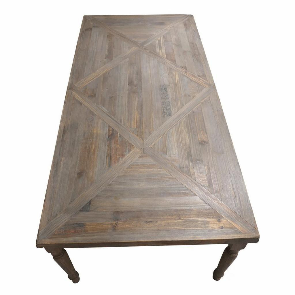 End view of farmhouse dining table showing lathe-turned baluster legs and straight apron clearance