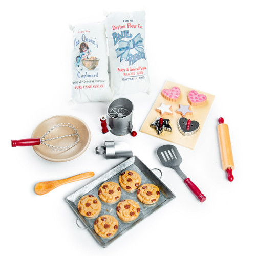 Against white backdrop all included pieces of  baking tools to make 18" doll baked goods are seen laid out plus included 18" doll cookies. Against white backdrop all included pieces of  baking tools to make 18" doll baked goods are seen laid out plus included 18" doll cookies.