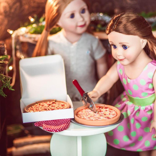 In home play scene, two 18 inch girl dolls serve slices of pizza from delivery box and metal pan.