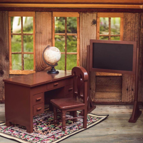 This lifestyle photograph showcases a vintage-style miniature wooden schoolroom furniture set designed for 18-inch doll displays.