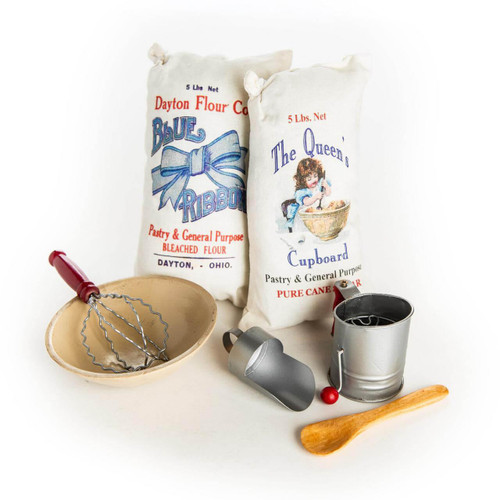 18 inch doll kitchen tool set includes a sack of flour and sugar; wooden mixing bowl and spoon; tin flour sifter; tin scoop; and wood handled mixing whisk.