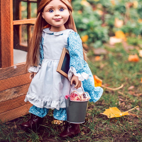 Little House on The Prairie Mary Ingalls 18 Inch Doll carrying her pail lunch and chalkboard under arm. Little House on The Prairie Mary Ingalls 18 Inch Doll carrying her pail lunch and chalkboard under arm.
