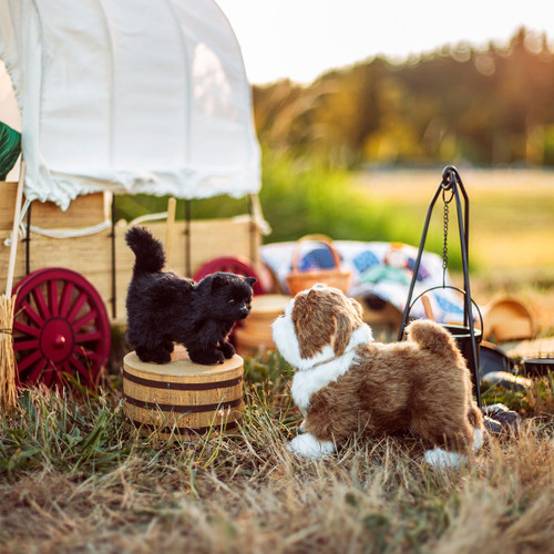 In prairie scene the Little House Black Susan and Jack the Bulldog for 18 inch dolls playfully face each other. In prairie scene the Little House Black Susan and Jack the Bulldog for 18 inch dolls playfully face each other.