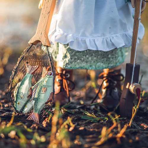 Up close image of our 18" doll holding the fishing net, with fish, and the fishing pole. Doll is wearing 18" doll clothes and 18 inch doll shoes. Up close image of our 18" doll holding the fishing net, with fish, and the fishing pole. Doll is wearing 18" doll clothes and 18 inch doll shoes.