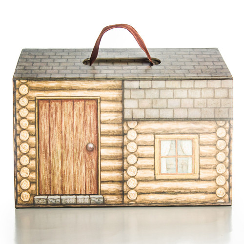 Fiberboard log cabin box holds all pieces in the set and folds up for easy storage.