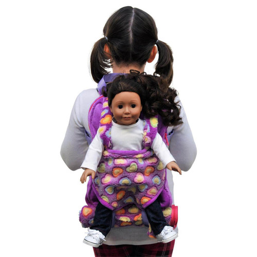 Up close image of an 18" doll inside the carrier, on the rear of the backpack.