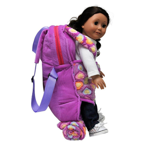 Side image of an 18 inch doll inside the doll carrier.