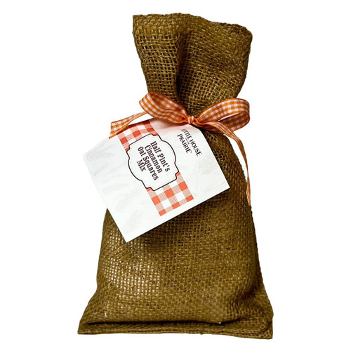 Little House on the Prairie Half-Pints Cinnamon Oatmeal Bar Mix packaged in burlap bag with gingham ribbon and label. Little House on the Prairie Half-Pints Cinnamon Oatmeal Bar Mix packaged in burlap bag with gingham ribbon and label.