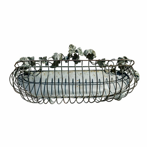 Vintage 34inch iron planter against a white backdrop.