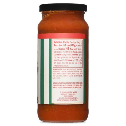 The nutrition and ingredient panel on the side of a 16 oz jar of Mom's Classic Garlic and Basil Pasta Sauce, displayed vertically on a clean white background. The red-bordered text box lists nutrition metrics like 45 calories per 1/2 cup serving alongside an ingredients list detailing San Marzano-style tomatoes, basil, and whole garlic cloves.