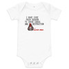 White Baby bodysuit featuring a cute but devilish character and the phrase "I have come from Heaven to cause chaos and destruction, Love me."