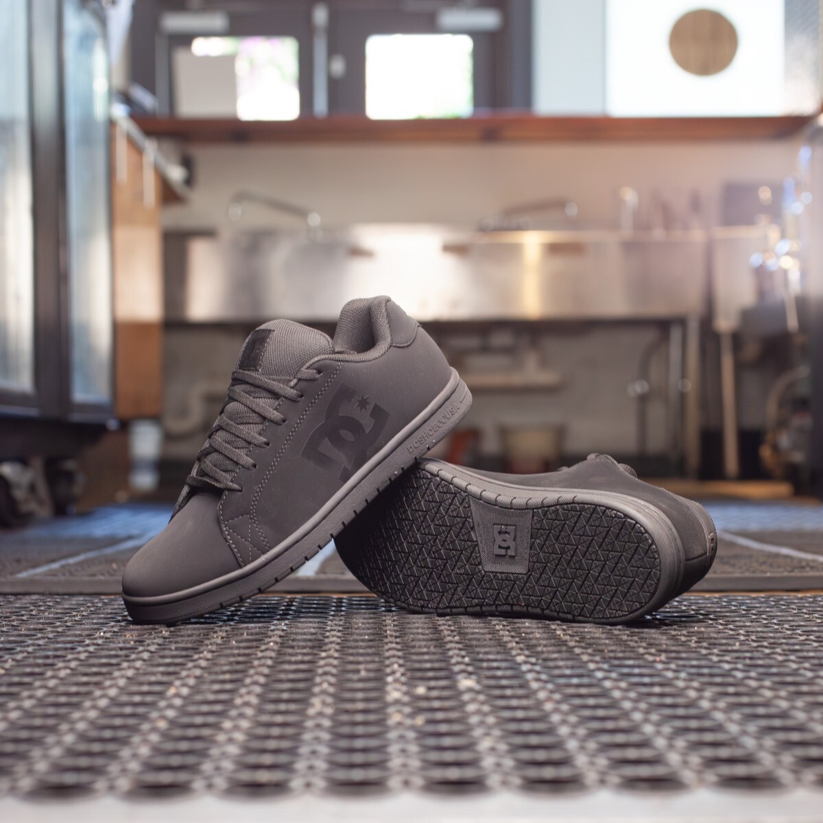 DC Work Crew kitchen shoes in style DC60401 sitting on a restaurant kitchen floor