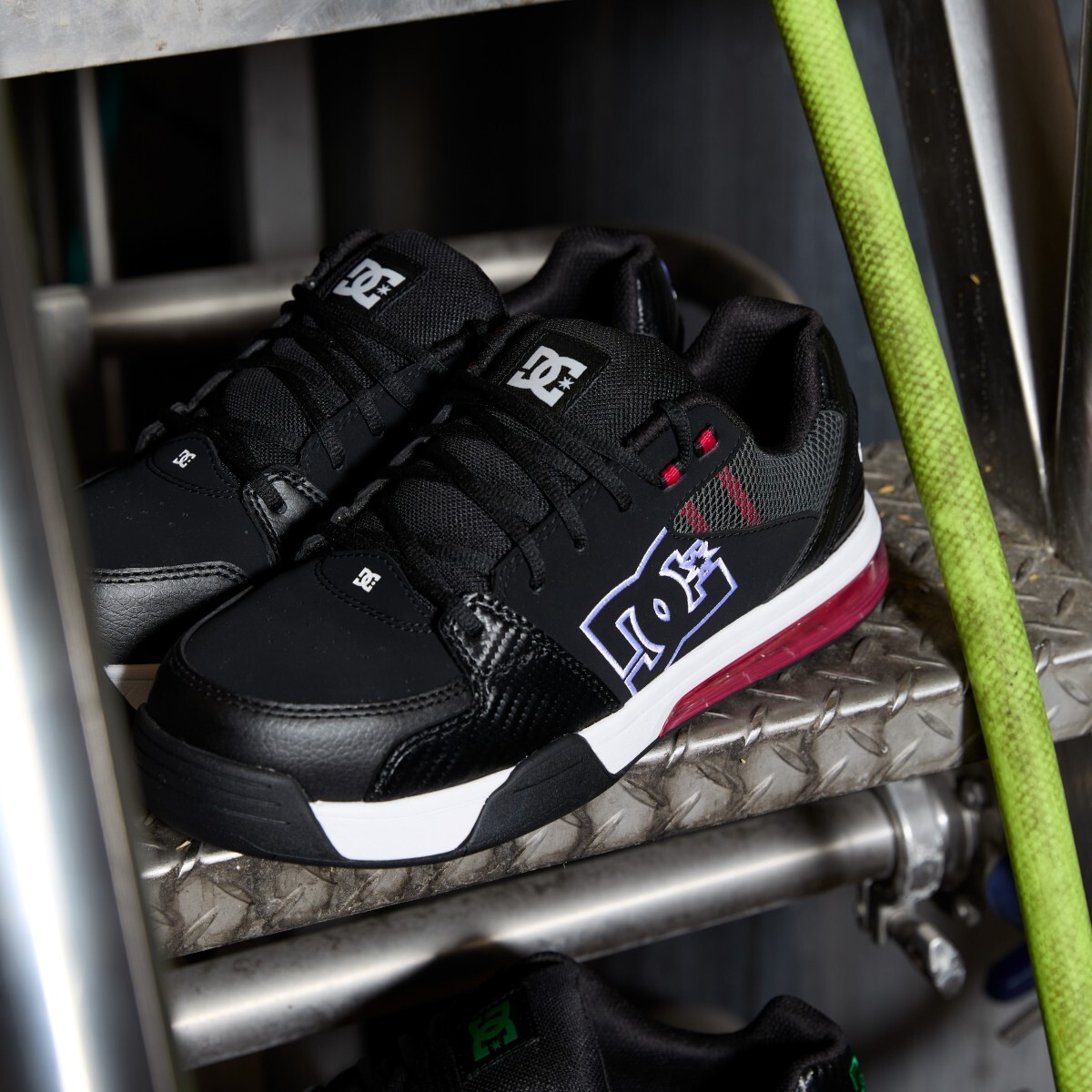 Pair of DC60803 mechanic shoes sitting on a metal step