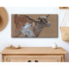 Baby goat painting in an entryway scene