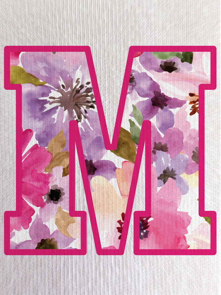 Close-up of our signature soft floral print inside the ‘M’ - showcasing vibrant colours and fine print detail