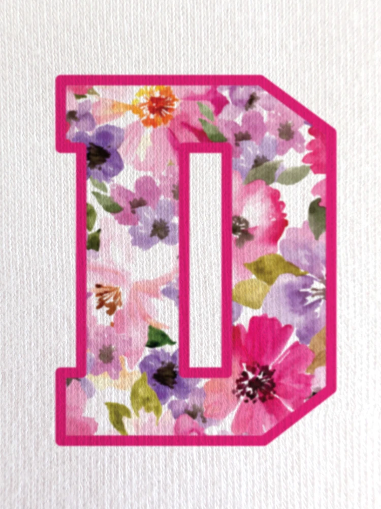 Close-up of our signature soft floral print inside the ‘D’ - showcasing vibrant colours and fine print detail