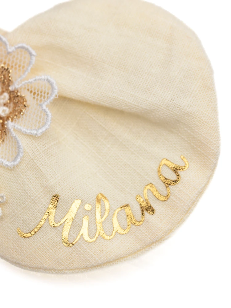 Personalised ivory bow hair elastic with metallic gold name