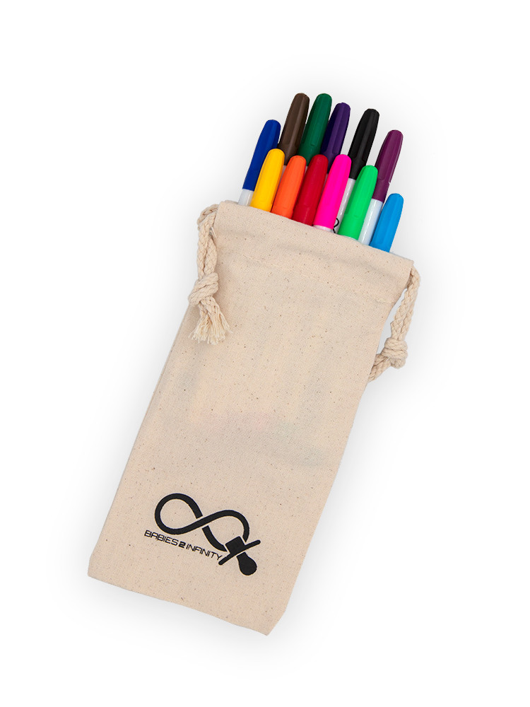 Set of 12 colourful washable markers in a reusable natural canvas drawstring storage pouch, included with the Christmas colouring bag.