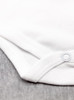 Close up shot of the onesie stitching Close up shot of the onesie stitching