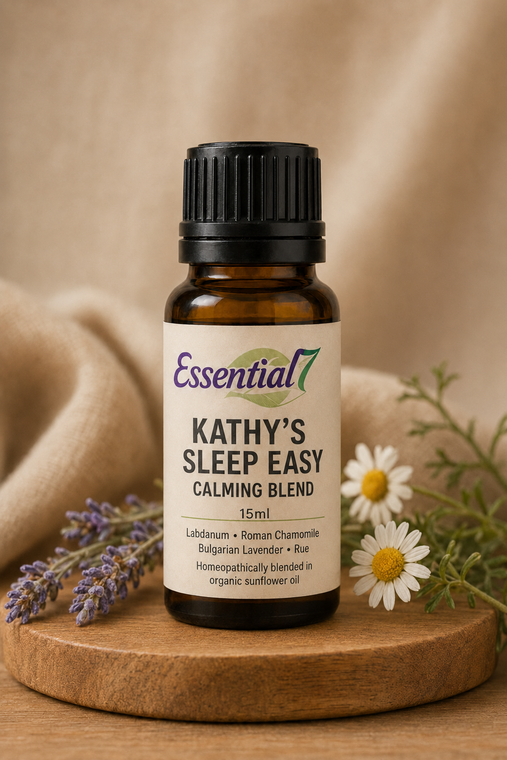 Essential7 Kathy’s Sleep Easy calming essential oil blend in a 15ml amber bottle with labdanum, Roman chamomile, Bulgarian lavender, and rue, homeopathically blended in organic sunflower oil.
