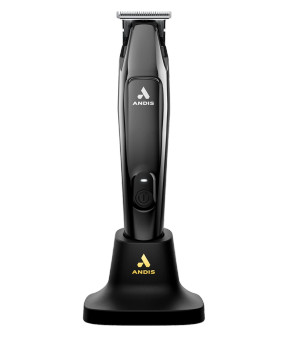The Andis Slimline Pro II Trimmer docked in its upright charging stand, demonstrating its compact footprint and modern design suitable for any barber station.