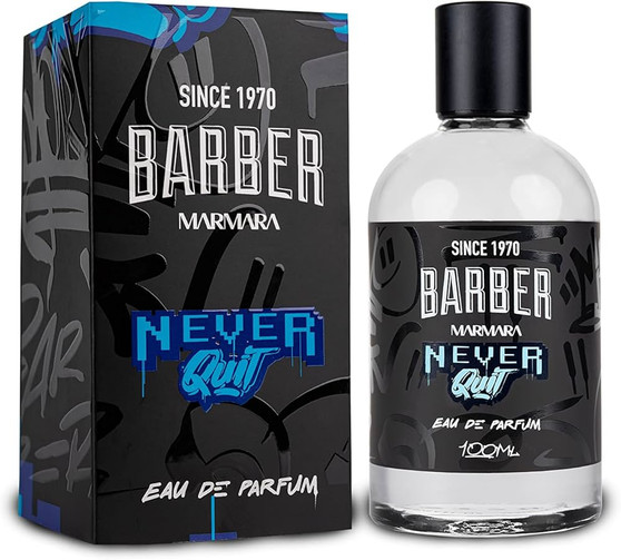 Studio product shot of the Marmara Barber "Never Quit" Eau de Parfum 100ml bottle next to its packaging, featuring a black box and label with distinctive blue pixelated and graffiti-style branding.