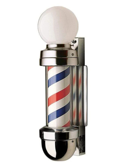 Studio product shot of the William Marvy No. 410 Two Light Barber Pole (Wall Mount), featuring a compact design topped with an illuminated white globe. The unit displays classic rotating red, white, and blue stripes encased in polished metal housing, designed for wall installation with an 8-inch projection.