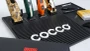 Cocco Hair Professional Magnetic Barber Arsenal Mat 18x12 holding four clippers (camo, green, orange, gold) with razor, blades, and combs – full station organization view