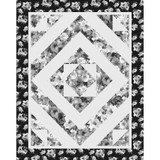 Make the Kaleidoscope Quilt by Fabric Cafe with fabrics from the Moonlit Walk collection by Maywood Studio.