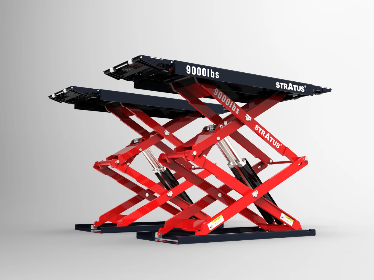 Stratus SAE-UT9000 G4 scissor lift platforms extended, side angle view showing dual hydraulic cylinders.