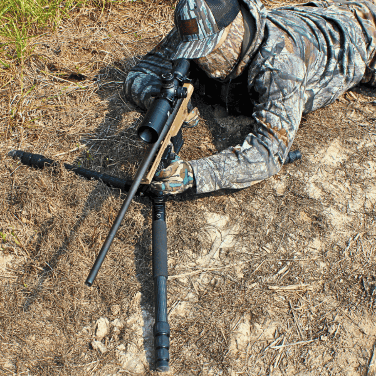 hunter on ground using UD Carbon Tripod