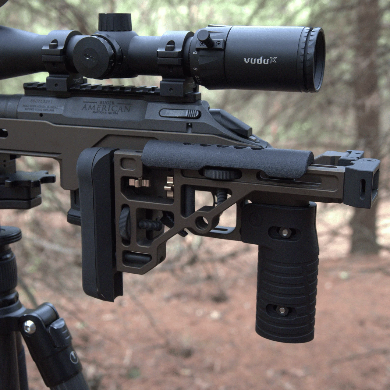 adjustable butt stock folded onto rifle 