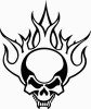 flaming tribal skull with fangs