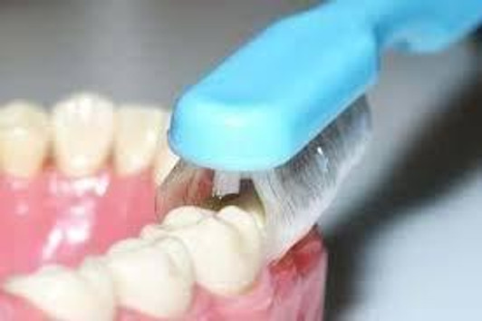 The Collis-Curve Toothbrush The Collis-Curve Toothbrush