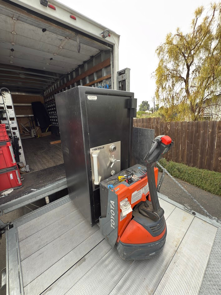 Safe on a truck tailgate lift during delivery preparation