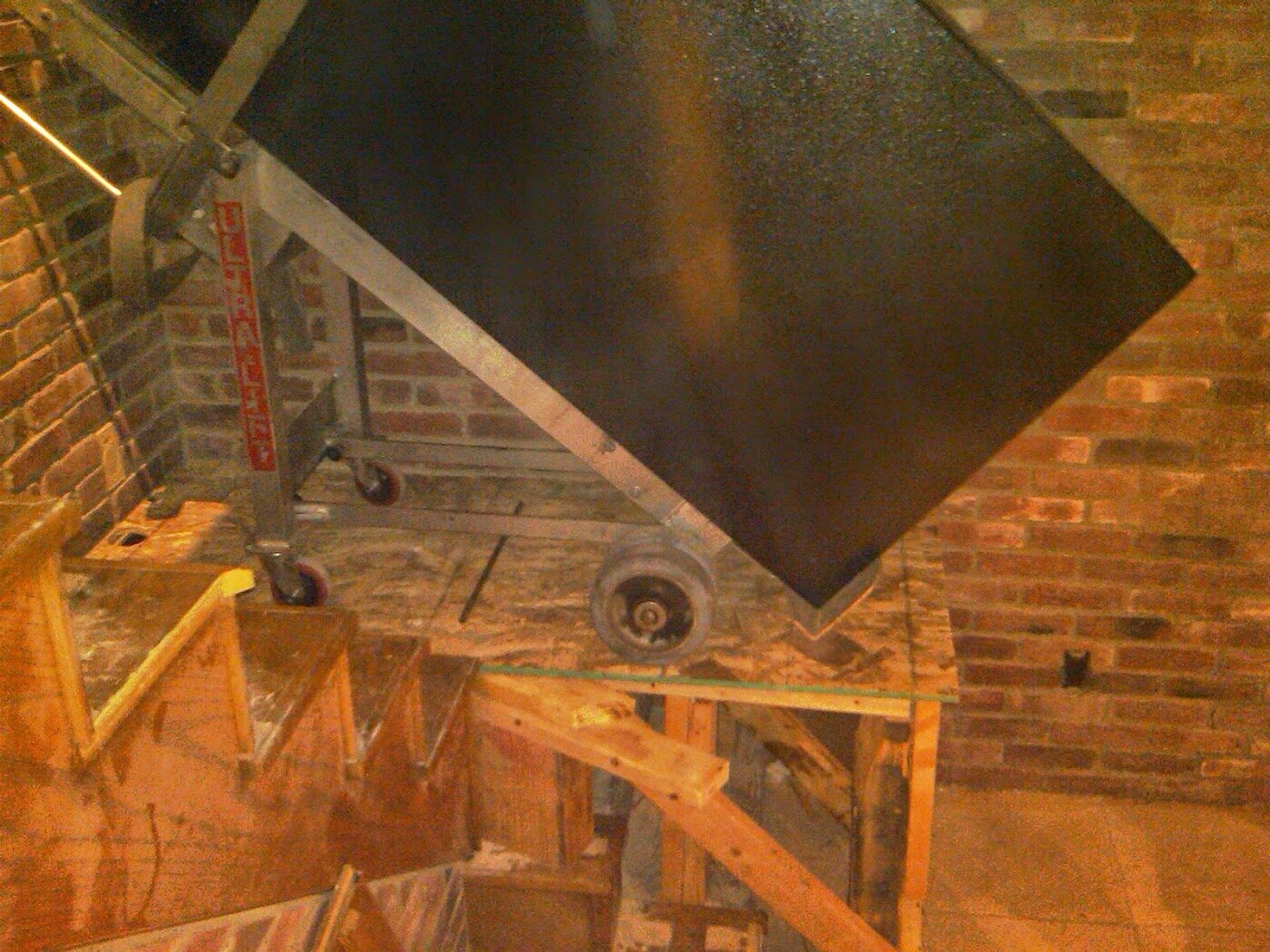 Boswell safe moving crew navigating a staircase