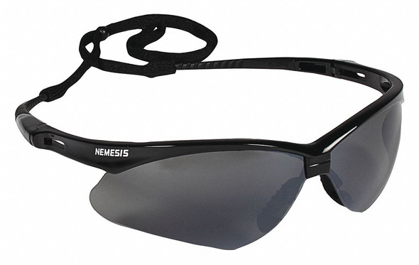 KleenGuard™ Personal Protective Equipment (PPE) enables rather than inhibits – allowing for maximum productivity and safety for you and your employees. Giving your employees what they need to do their job safely and effectively is a top priority of any business owner. KleenGuard™ Nemesis Safety Eyewear's stylish good looks and durable, lightweight construction are just some of the reasons why millions of people wear them for protection both at work and at home. Nemesis Safety Glasses have polycarbonate lenses that provide 99.9% UVA/ UVB/UVC protection to help prevent eye damage like cataracts, retinal damage, and other conditions that can cause temporary vision loss. The wraparound frame has a base curve of 8 that extends the range of peripheral protection, as well as soft touch temples for comfort. The Nemesis safety glasses have a patented nose piece designed to be extremely flexible, to channel sweat away from the eyes, and to help prevent slippage down the nose – all for long-term comfort. Each pair of KleenGuard™ Nemesis safety glasses come with a neck cord for securing them, so that the glasses are ready to protect at a moment's notice. The safety eyewear is manufactured to comply with the ANSI / ISEA Z87.1+ standard for personal eye protection. Both men and women will find these stylish glasses to be comfortable and functional for construction, manufacturing, gun shooting / shooting range, and a host of other industries. Remember: comfort and style drive compliance, so it pays to provide comfortable designer glasses that your staff will be proud to wear. Making the right Personal Protection choice is difficult. Perform with distinction with KleenGuard™ Personal Protective Equipment (PPE).

These KleenGuard™ Nemesis Safety Glasses (safety sunglasses) have a black frame and smoke anti-fog lenses for outdoor use: smoke anti-fog lenses are ideal for bright, sunny days to provide glare reduction, even when you are moving between hot, cold, and humid environments
KleenGuard™ Nemesis Smoke Anti-Fog Safety Glasses feature a sporty, flexible, lightweight design that your employees will be happy to wear; they have a stylish, sporty look and feel
Meets ANSI Z87.1+ standards for personal eye protection
Polycarbonate lenses provide 99.9% UVA/ UVB/UVC protection
Patented FLEX-DRY* designed to be extremely flexible, to channel sweat away from the eyes, and to help prevent slippage down the nose – all for long-term comfort