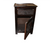 Handmade Moroccan dark wood nightstand with dense carved geometric star and polygon lattice pattern covering drawer front and cabinet door, traditional Islamic artisan carving in dark espresso finish