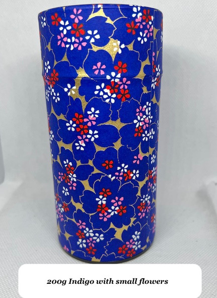 Origami paper covered tea canister.