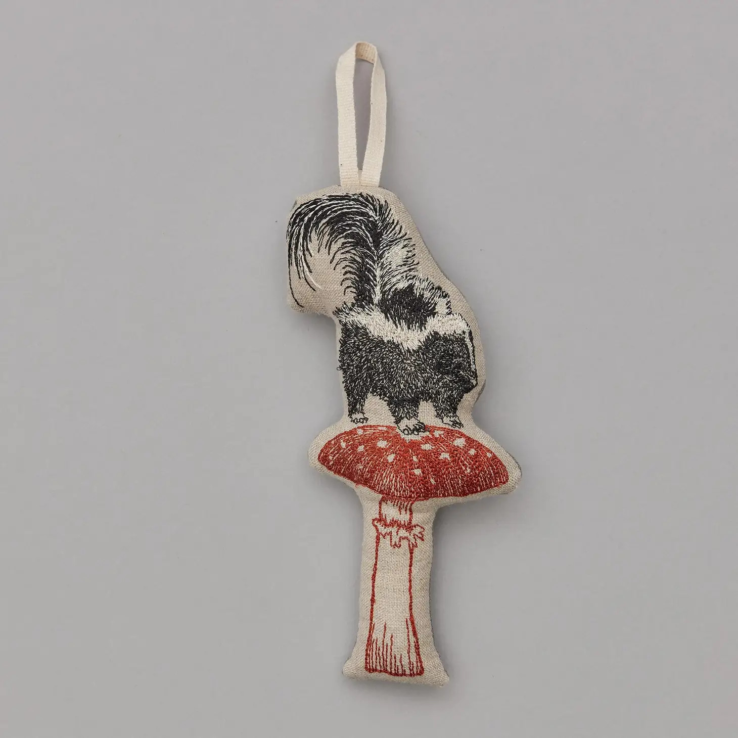 Embroidered Linen Skunk with Mushroom Ornament