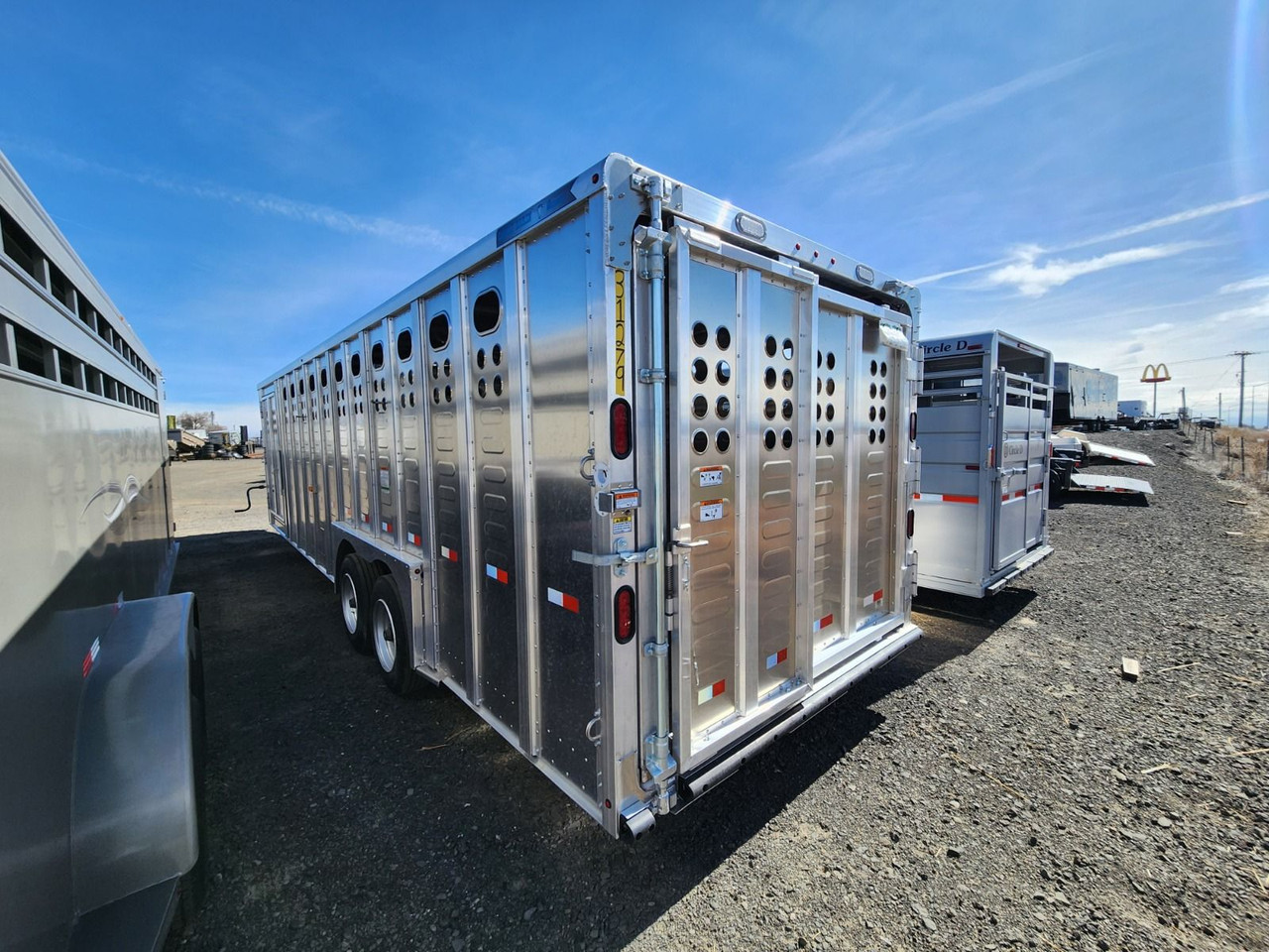 Merritt 2026 Aluminum Punchside 8'X28' Stock Trailer | Tandem Axle 8k 52" Escape Door, 2 Center Gates