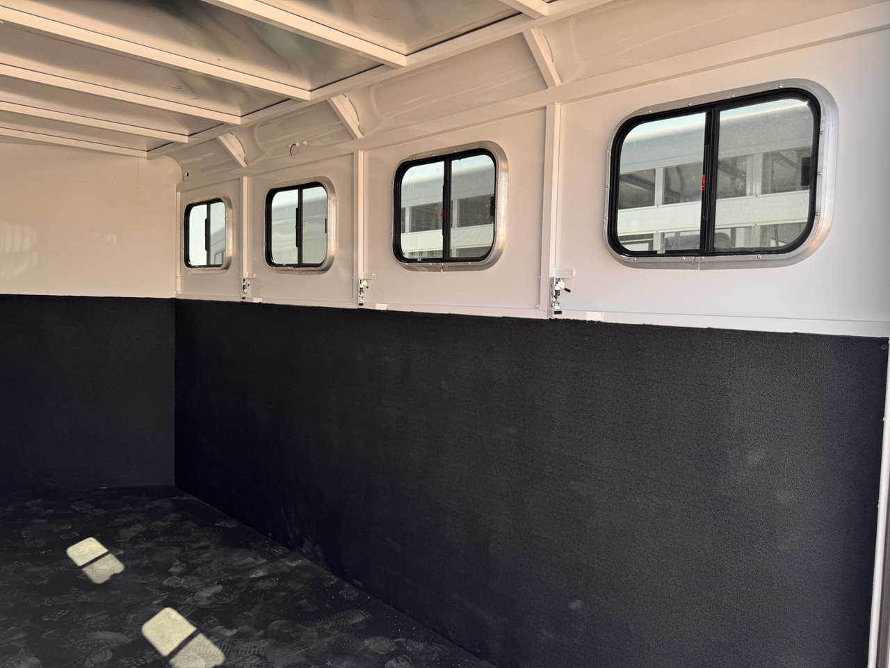 Trails West Trailers 2027 Adventure MX Horse Trailer | Tandem Axle Axle 13.867K, 4 Horse, Feed Windows, Rubber Floors, Rear Barn Doors Tack Room, Swing Out Saddle Racks,Water Tank