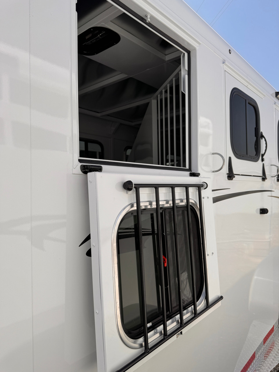 Trails West Trailers 2027 Adventure MX Horse Trailer | Tandem Axle Axle 13.867K, 4 Horse, Feed Windows, Rubber Floors, Rear Barn Doors Tack Room, Swing Out Saddle Racks,Water Tank