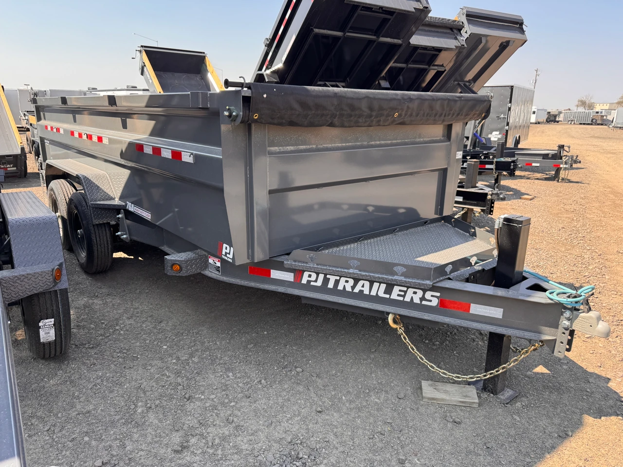 P.J. Trailers 2027 DM 83"X16' Low Profile Dump Trailer | Tandem Axle 14K, 36" Tall Sides, 7 GA Floors, Hydraulic Jack, Locking Box, 2 Way Spreader Gate, Slide In Ramps