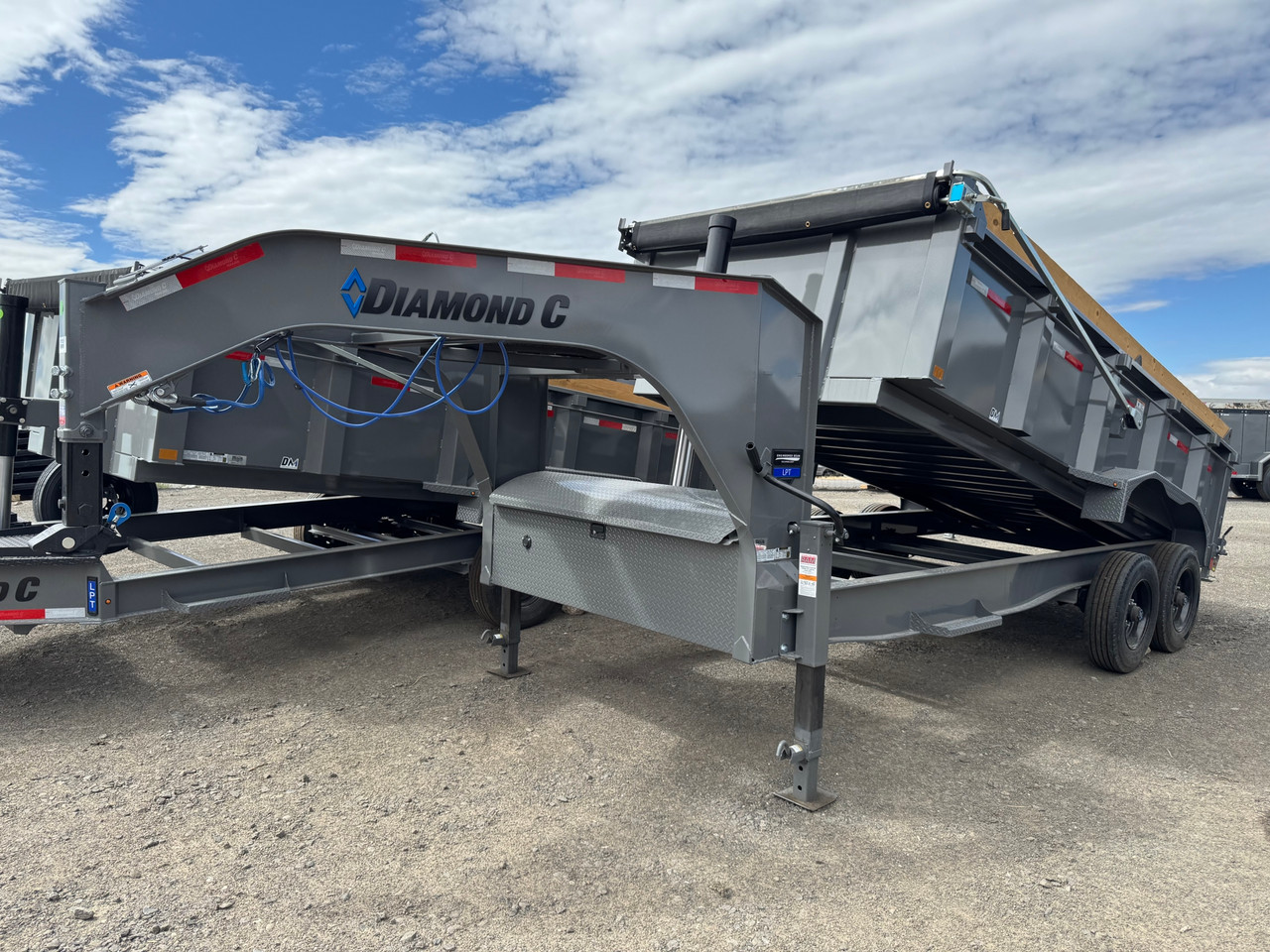 Diamond C Trailers LPT210 82"X16' Telescopic Dump Trailer | Tandem Axle, Torsion axles, 32" SIdes w/ Board Brackets, 3/16" HD Fenders, Solar Recharging, Spare
