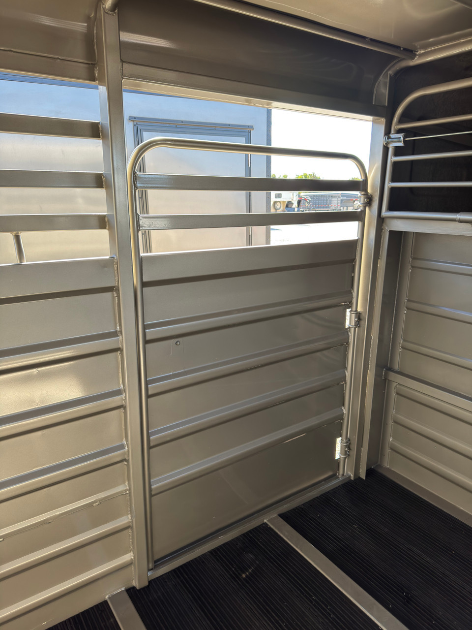 GR Trailers 2027 80"X24' Stock Trailer | Tandem Axle 14K, SMOOTH RUBBER FLOOR, ESCAPE 48", BUTTERY FLY GATE, 2 CENTER GATES (ONE SLIDE)