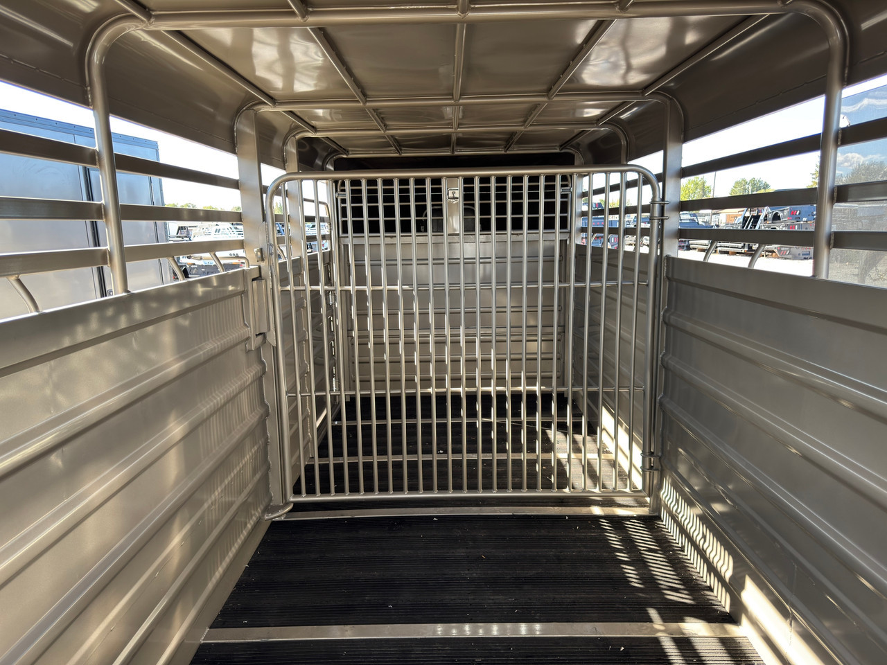 GR Trailers 2027 80"X24' Stock Trailer | Tandem Axle 14K, SMOOTH RUBBER FLOOR, ESCAPE 48", BUTTERY FLY GATE, 2 CENTER GATES (ONE SLIDE)
